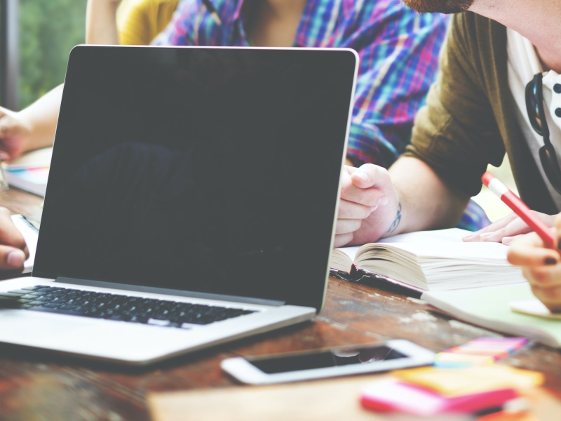 Meeting around a laptop